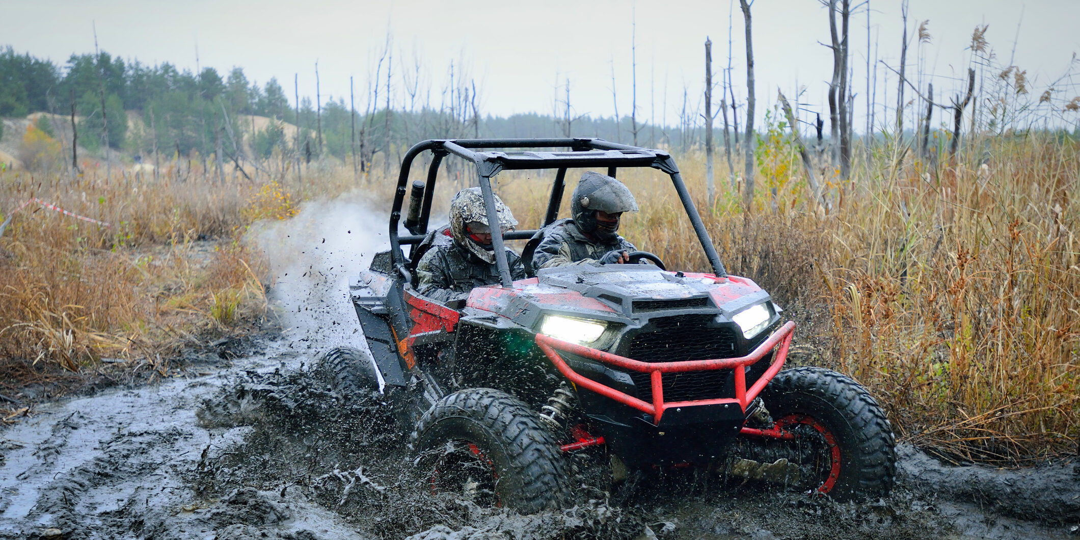 ATV, buggy, quad and UTV offroad vehicle racing in hard track with mud splash. Extreme, adrenalin. 4×4