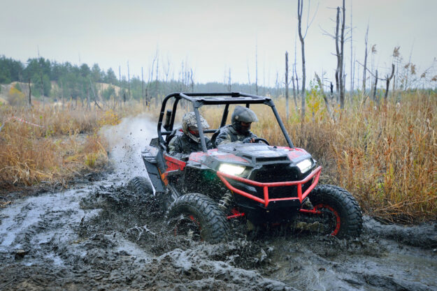 ATV, buggy, quad and UTV offroad vehicle racing in hard track with mud splash. Extreme, adrenalin. 4×4