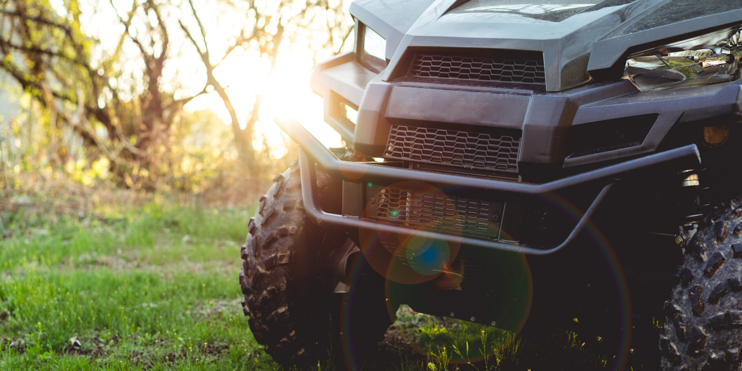 UTV or ATV 4×4 recreational vehicle at sunset